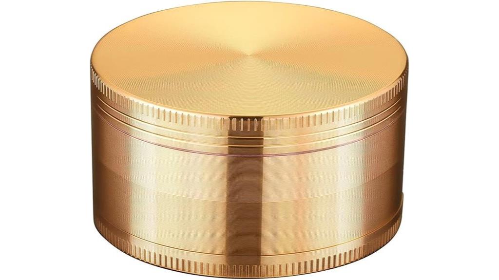 gold colored 3 inch spice grinder